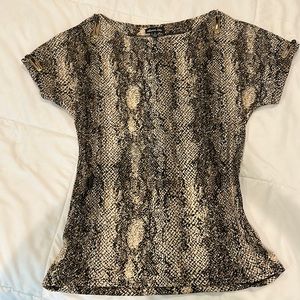 Animal Print Top . Size S and M fit both very good .